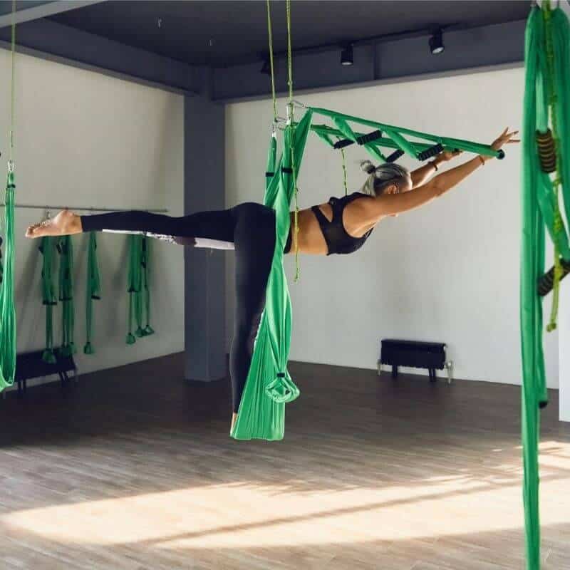 Athletic Man Doing Inverted Pigeon Pose while Practicing Aerial Yoga Stock  Photo - Image of male, instructor: 188803120